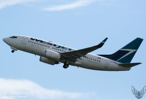 C-FIWJ · Boeing 737-700, Pointe-à-Pitre – Maryse Condé